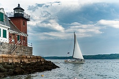 Sailboat Passes Tower of Rockland Breakwater Light